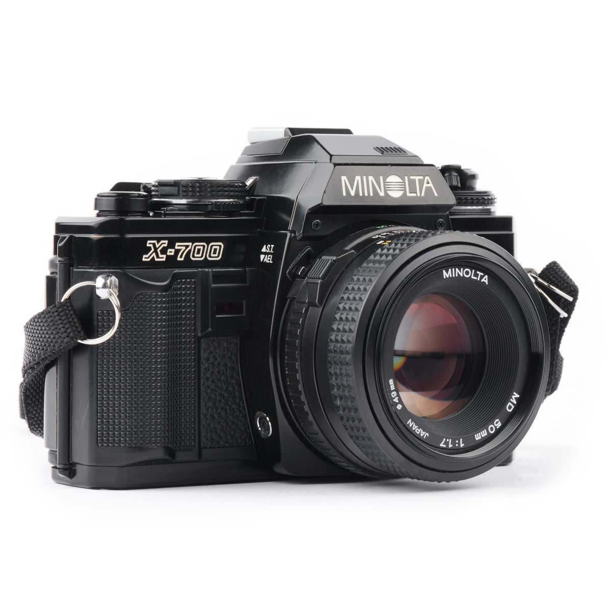 Minolta X-700 Cámara SLR de 35 mm con sistema de lente de montura MD. Incluye lente de enfoque manual f/2 de 50 mm (reacondicionado)