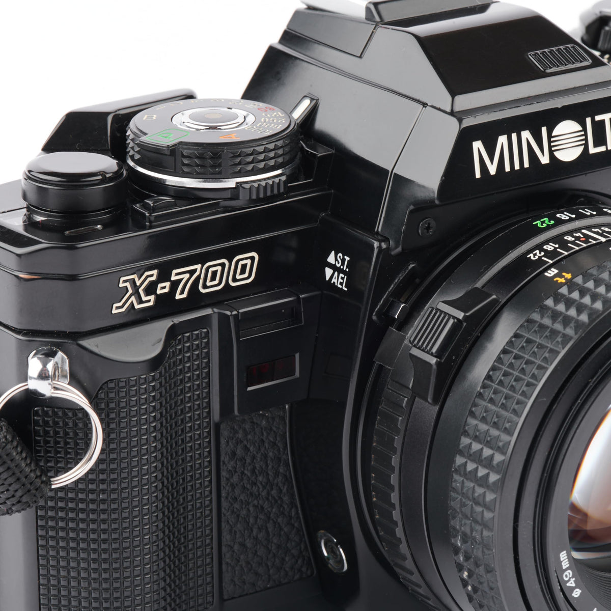 Minolta X-700 Cámara SLR de 35 mm con sistema de lente de montura MD. Incluye lente de enfoque manual f/2 de 50 mm (reacondicionado)